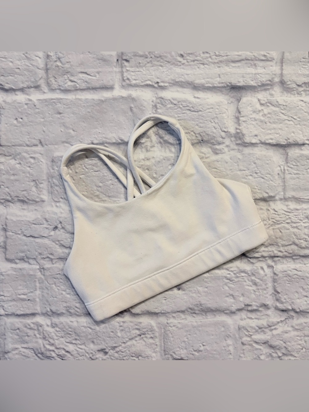 Athleta Girl white medium-support sports bra (XS/6 youth)